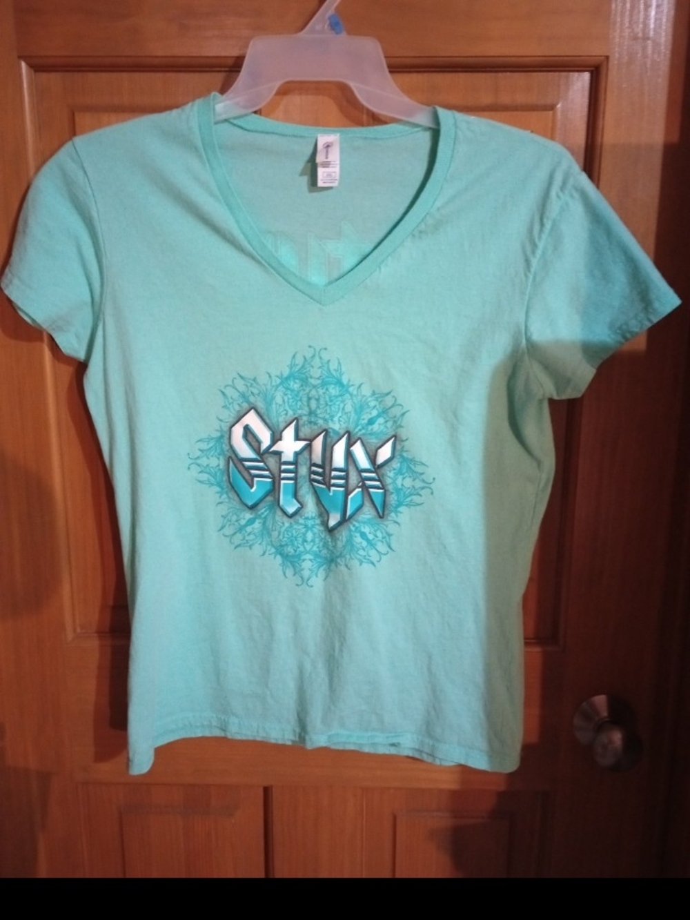 Women's V-Neck Graphic Tee in Aqua - Stylized Front Logo